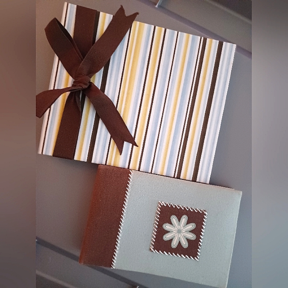 (2) Photo Albums- bigger one with ribbon has 10 pages, smaller album 12 pages